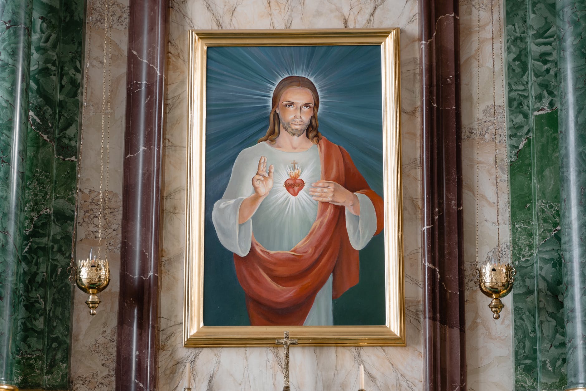 a painting of jesus christ hanged on the wall