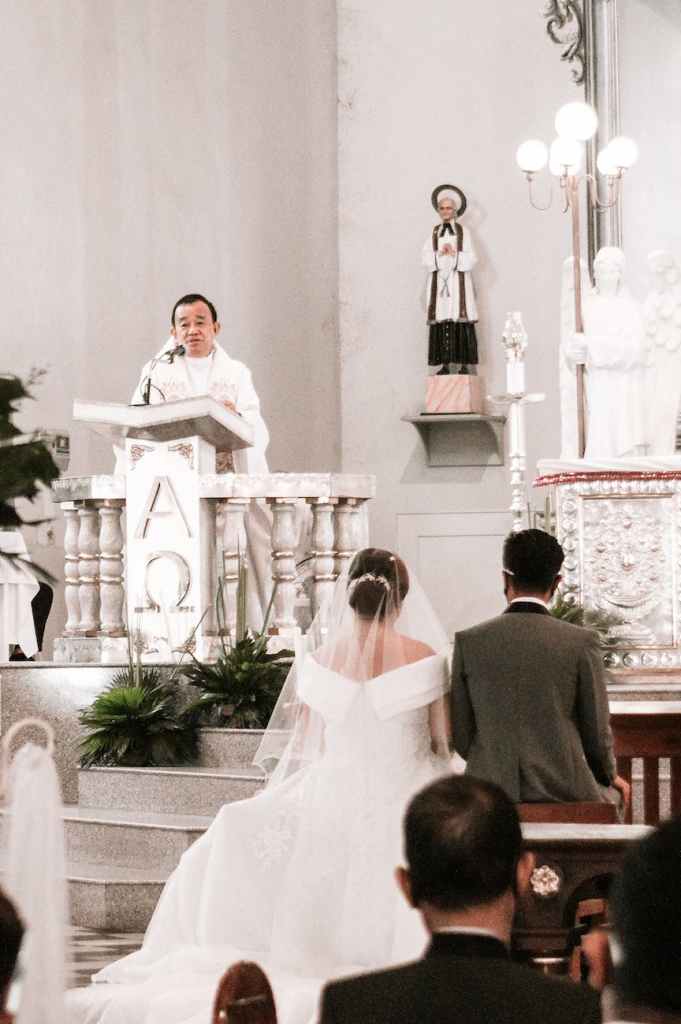 priest at wedding ceremony in church