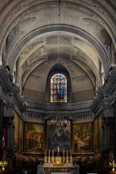 majestic interior of parisian church with stained glass